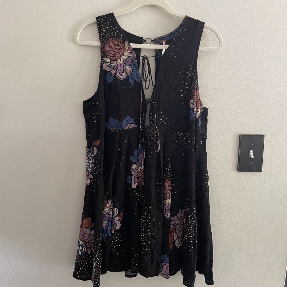 Free People size small dress. Black floral. With key hole in the back